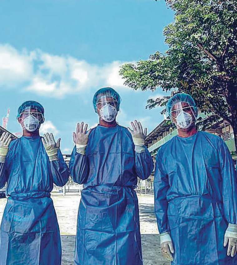 Group of people with PPE suit